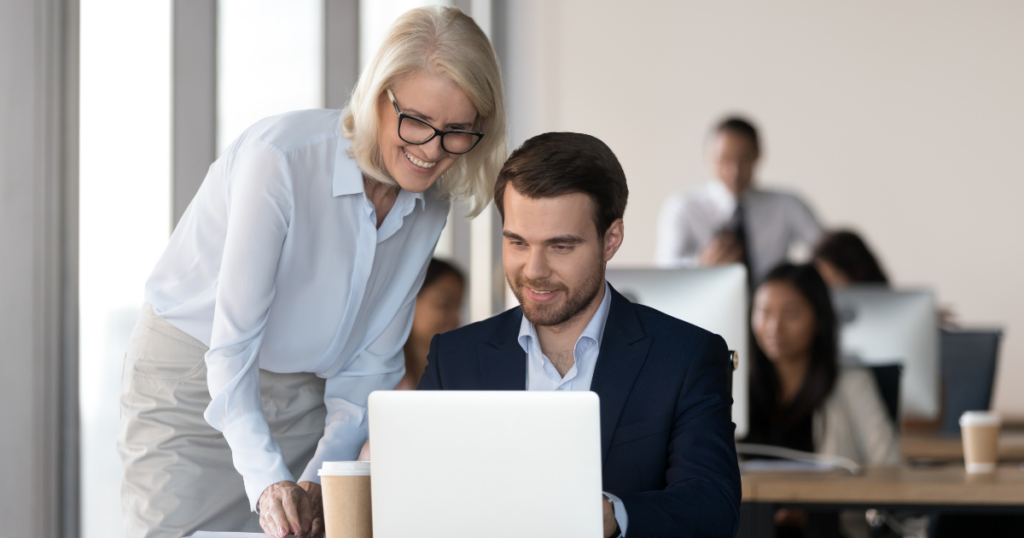 Image showing professionals working in an office and interacting with each other